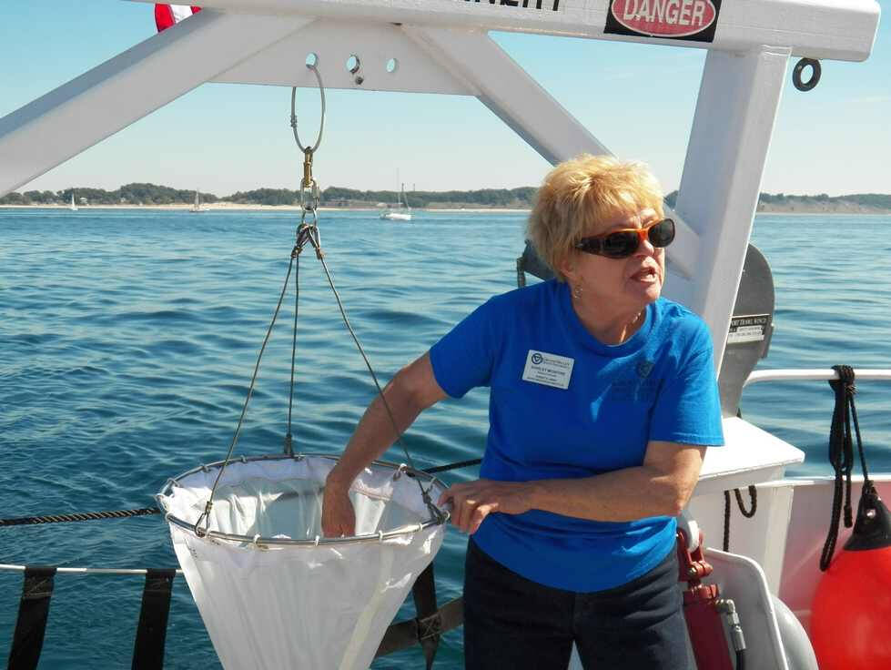 An AWRI instructor demonstrates the use of a plankton tow net.